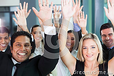 Team raising hands