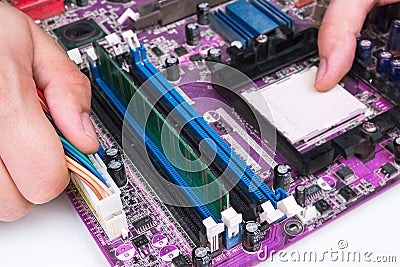 Technician repairing computer hardware