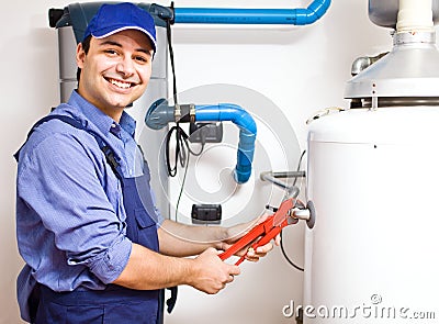 Technician repairing an hot-water heater