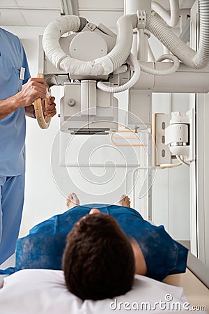 Technician Taking Patient s X-ray