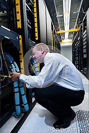 IT technician working on network servers