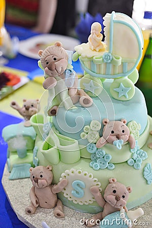 Teddy bear on a baby birthday cake