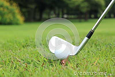 Teeing off in a game of golf