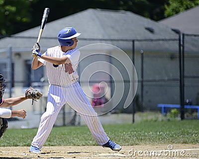 Teen baseball batter