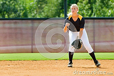 Teen girl playing softball
