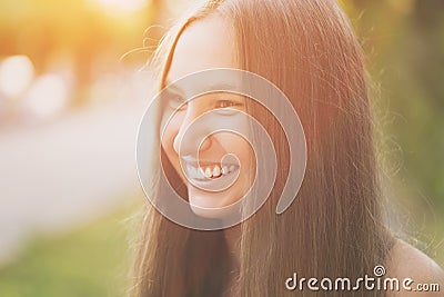 Teen girl smiling on outdoor walk