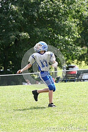 Teen Youth Football Ready to Catch Ball