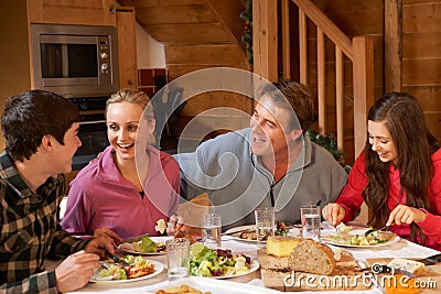 Teenage Family Enjoying Meal