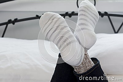 Teenage Girl Socks with Legs Crossed Closeup