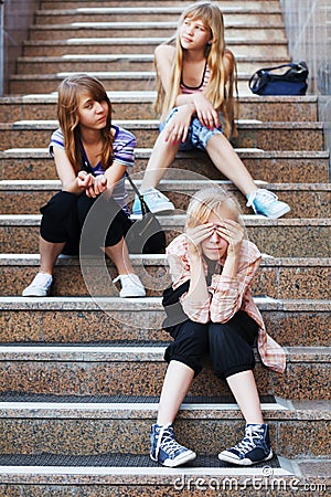 Teenage girls on a steps