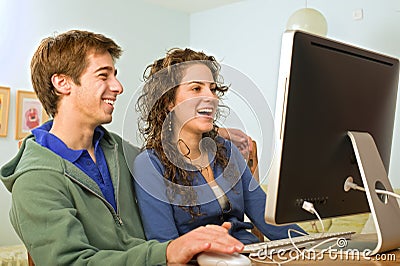 Teenager couple computer