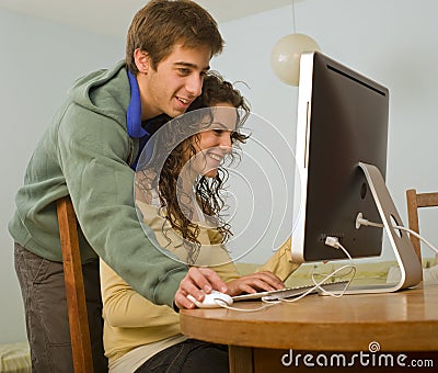 Teenager couple computer