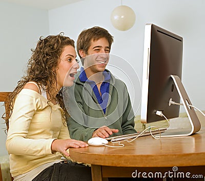 Teenager couple computer