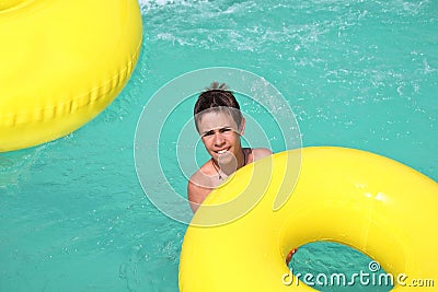 Teenager floating on yellow circle