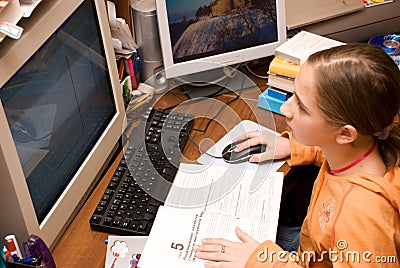 Teenager girl learning a computer