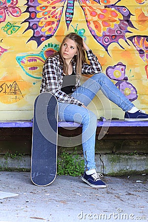 Teenager with skateboard