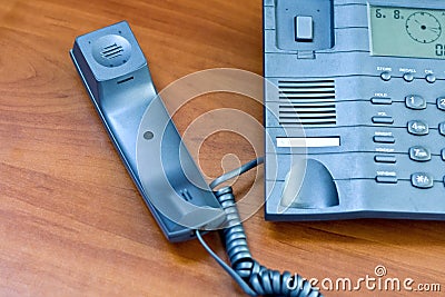 Telephone with receiver put aside