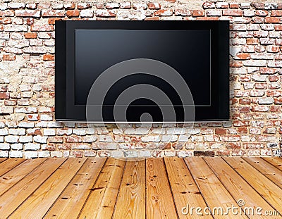 Television set on an old wall