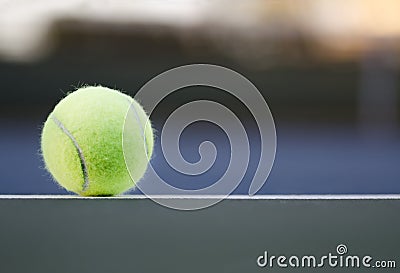 Tennis Ball on the Court Close up with room for copy