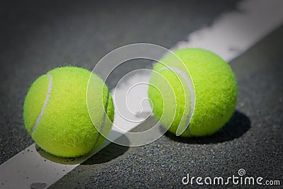 Tennis Balls on Har-Tru clay tennis court