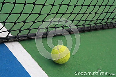 Tennis on court with net