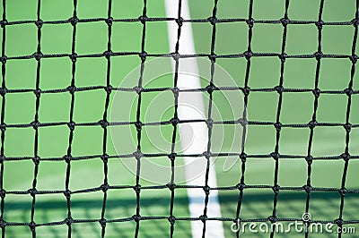 Tennis courts with close up of net