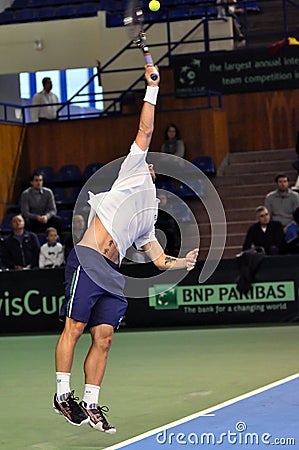 Tennis man Adrian Ungur in action at a Davis Cup match