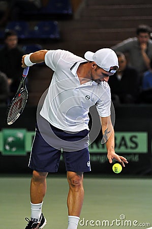 Tennis man Adrian Ungur in action at a Davis Cup match