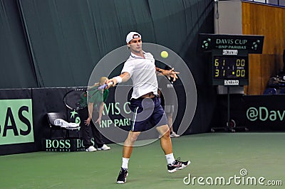 Tennis man Adrian Ungur in action at a Davis Cup match