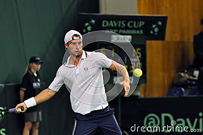 Tennis man Adrian Ungur in action at a Davis Cup match