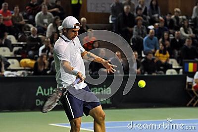 Tennis man Adrian Ungur in action at a Davis Cup match