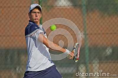 Tennis Player Focus Ball