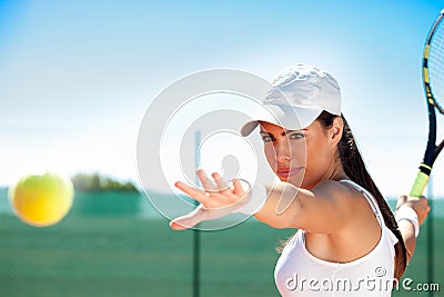 Tennis player ready to hit ball