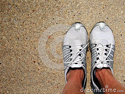 Tennis Shoes on Concrete