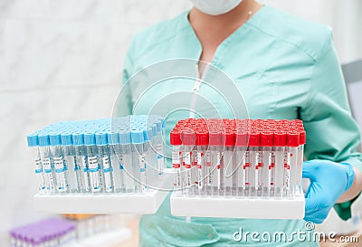 Test tubes in nurses hands