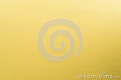 Texture of yellow cotton fabric as abstract background.