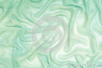 Textures of sea-green fabric
