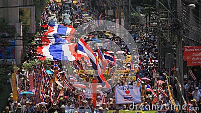 Thai protestors rally with large thai flag