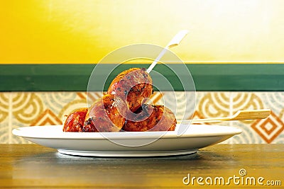 Thai Sausage food lunch on wood table with yellow wall background , delicious ,Thai