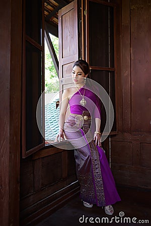 Thai woman wearing typical Thai dress