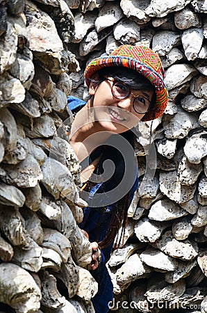Thai women portrait with Oyster Shell wall in Wat Chedi Hoi