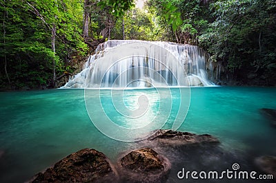 Thailand outdoor photography of waterfall in rain jungle forest.