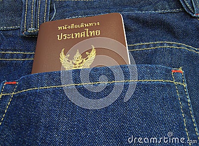 Thailand Passport in denim jeans pocket