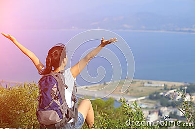 Thankful hiking woman seaside mountain