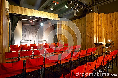 Theater interior with red chairs. Nobody