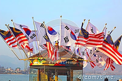 There are many flag ferry to Nami Island, Korea