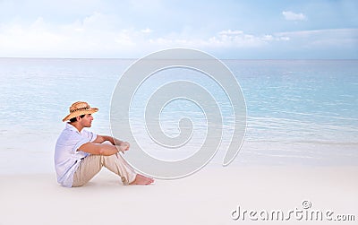 Thoughtful man on the beach