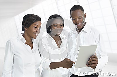 Three african business people with tablet PC