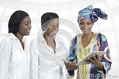 Three african business women with tablet PC