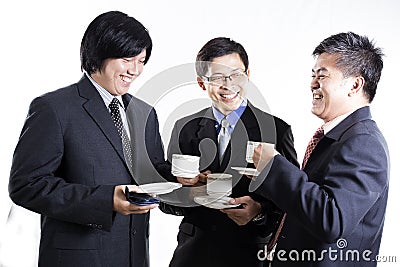 Three Asian business man with coffee break having conversation